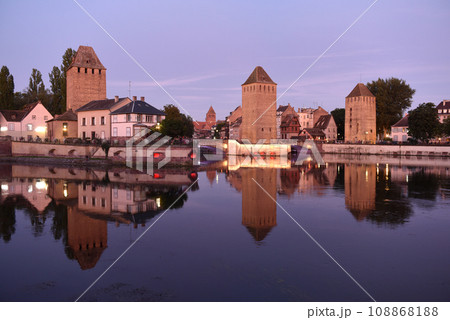 Ponts Couverts in Strasbourg, France. The bridges and three towers of the Ponts Couverts in Strasbourg. Strasbourg cityscape at night. 108868188