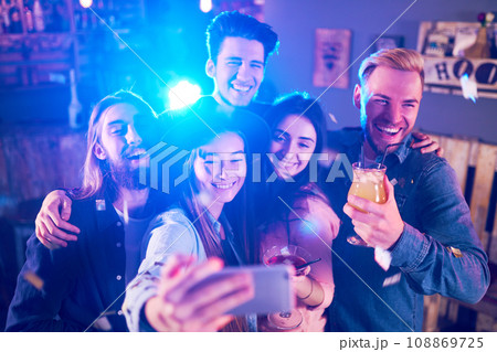 Selfie Time.Young Group of Friends Partying In A Nightclub And Toasting Drinks. Happy Young People. 108869725