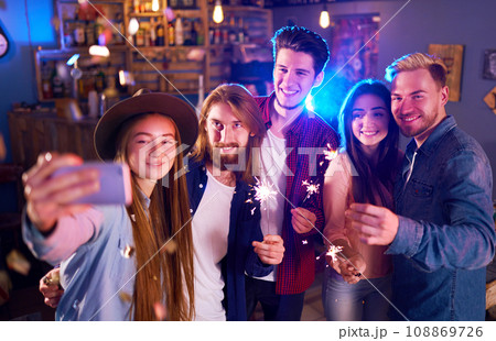 Selfie Time.Young Group of Friends Partying In A Nightclub And Toasting Drinks. Happy Young People. Selfie Time.Young Group of Friends Partying In A Nightclub And Toasting Drinks. Happy Young People. 108869726