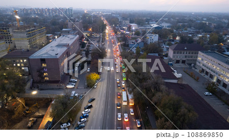 A crossroads with a lot of cars, buses and trucks 108869850