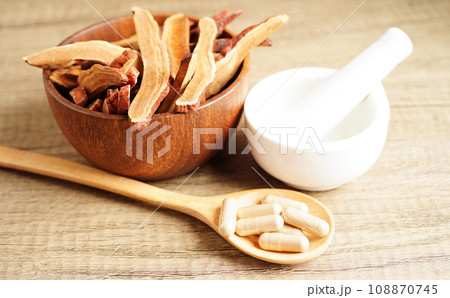Lingzhi or Reishi mushroom with capsules, organic natural healthy food. Lingzhi or Reishi mushroom with capsules, organic natural healthy food. 108870745