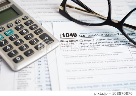 Tax form 1040 U.S. Individual Income Tax Return, business finance concept. Tax form 1040 U.S. Individual Income Tax Return, business finance concept. 108870876