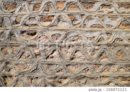 texture of cement and limestone walls with bricks. 108872121