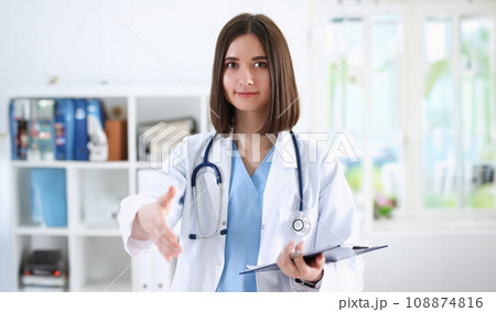 Female medicine doctor hold pad and 108874816
