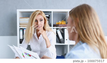 Beautiful smiling businesswoman portrait at workplace Beautiful smiling businesswoman portrait at workplace 108875017