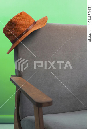 a hat on the edge of a chair, rest concepts, a day off. Rest a hat on the edge of a chair, rest concepts, a day off. Rest 108876454