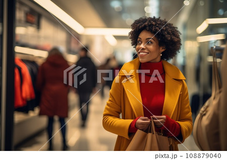 woman african america shopping in supermarket or department store. 108879040