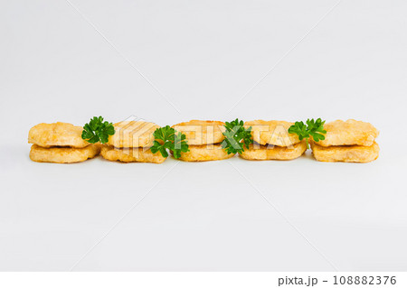 Breaded Chicken nuggets Fillet with salad on a White Background,food at home. Fast homemade food.Chicken breaded schnitzels. Breaded Chicken Inner Fillet, Chicken Breaded Raw Meat. Fast cooking. Breaded Chicken nuggets Fillet with salad on a White Background,food at home. Fast homemade food.Chicken breaded schnitzels. Breaded Chicken Inner Fillet, Chicken Breaded Raw Meat. Fast cooking. 108882376