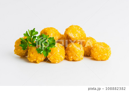 Chicken Breaded Fillet. Breaded chicken nuggets. Fast homemade food at home. Chicken breaded schnitzels. Breaded Chicken Inner Fillet on a White Background,Chicken Breaded Raw Meat. Fast cooking. 108882382