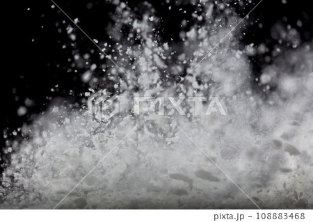 Tapioca starch flour fly explosion, White powder tapioca starch fall down in air. Seasoning flour powder is element material. Eyeshadow crush make up. Black background Isolated selective focus blur Tapioca starch flour fly explosion, White powder tapioca starch fall down in air. Seasoning flour powder is element material. Eyeshadow crush make up. Black background Isolated selective focus blur 108883468