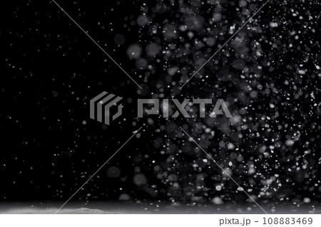 Tapioca starch flour fly explosion, White powder tapioca starch fall down in air. Seasoning flour powder is element material. Eyeshadow crush make up. Black background Isolated selective focus blur 108883469