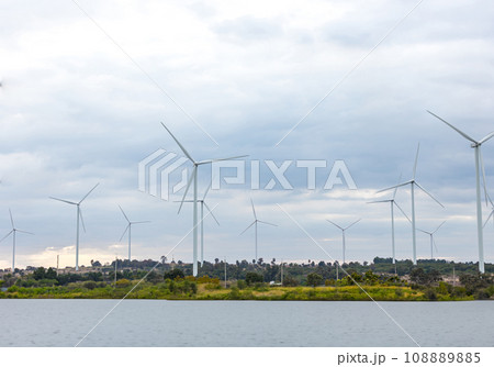 Wind Turbines Windmill Energy Farm. windmill wind turbines in field. 108889885