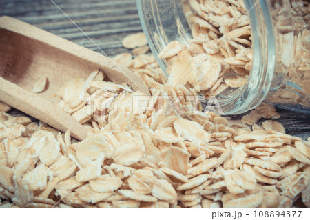 Healthy rye flakes or oat bran as source dietary fiber and minerals. Nutritious eating 108894377