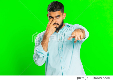 Man pointing at her eyes and camera show I am watching you gesture spying watching on someone Man pointing at her eyes and camera show I am watching you gesture spying watching on someone 108897286