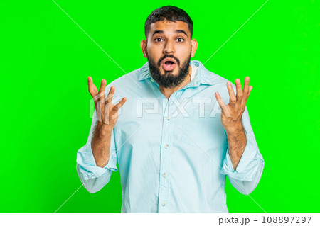 Excited amazed man surprise looking at camera with big eyes, shocked by sudden victory wow emotion Excited amazed man surprise looking at camera with big eyes, shocked by sudden victory wow emotion 108897297