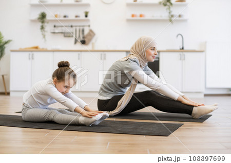 Motherhood and sporty lifestyle concept. Motherhood and sporty lifestyle concept. 108897699