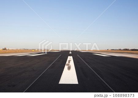 Surface and marking of long airport runway 108898373