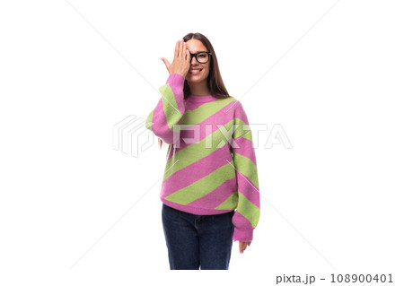 pretty beautiful young european brunette woman with vision glasses dressed in casual striped pink pretty beautiful young european brunette woman with vision glasses dressed in casual striped pink 108900401