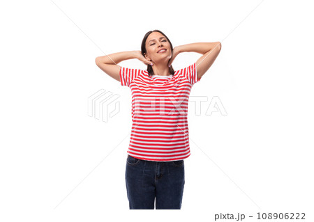 young satisfied cheerful brunette woman in a red-white striped t-shirt on a white background with young satisfied cheerful brunette woman in a red-white striped t-shirt on a white background with 108906222