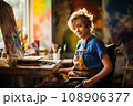 Portrait of disabled female artist on wheelchair in art studio 108906377