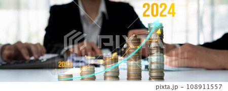 Growth coin stack symbolizing business investment in new year 2024. Shrewd Growth coin stack symbolizing business investment in new year 2024. Shrewd 108911557