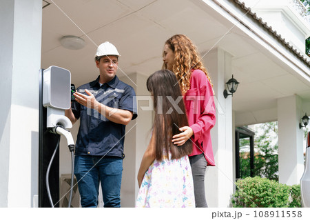 Technician provide service support for EV app to customer. Synchronos Technician provide service support for EV app to customer. Synchronos 108911558