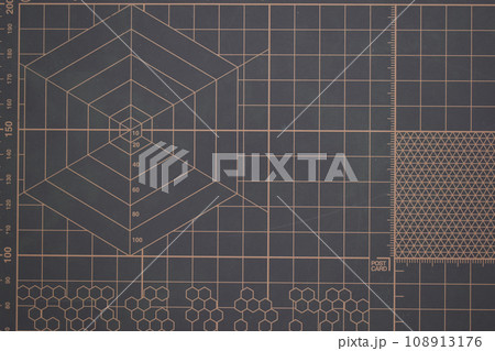 closeup brown cutting mat, equipment in office closeup brown cutting mat, equipment in office 108913176