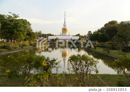 The pagoda is Phra That Na Dun a sacred place built for the prosperity of the region. It is the center of Buddhism and arts and culture. Located at Maha Sarakham Province in Thailand. The pagoda is Phra That Na Dun a sacred place built for the prosperity of the region. It is the center of Buddhism and arts and culture. Located at Maha Sarakham Province in Thailand. 108913853