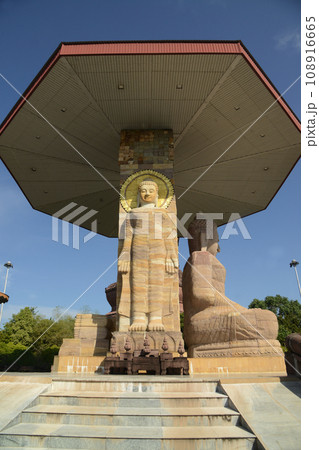 Phra Mahathat Jedi Phuttha Nimit and sand stone sitting buddha in Wat Phuttha Nimit or Wat Phu Khao. Which here is one of the important religions at Kalasin Province in Thailand. 108916665