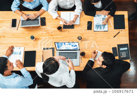 Panorama top view diverse analyst team analyzing financial data. Meticulous Panorama top view diverse analyst team analyzing financial data. Meticulous 108917671