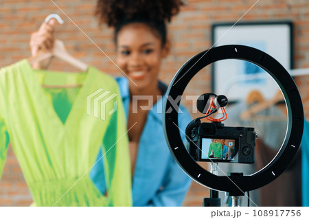 Woman influencer shoot live streaming vlog video review clothes crucial social 108917756