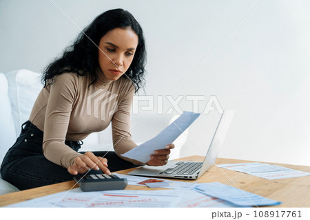 Stressed young woman has financial problems credit card debt to pay crucial 108917761