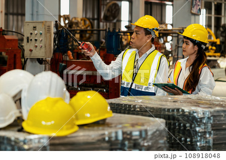 Factory engineer with assistant using inspect factory. Pano Exemplifying 108918048
