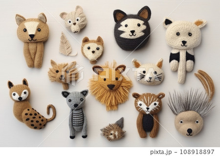 collection of handmade toys. knitted goods, felted wool and cotton stitched animals. 108918897