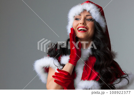 Girl wearing santa claus clothes Girl wearing santa claus clothes 108922377