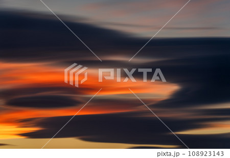Vibrant Long Exposure of Dusk Sky with Multicolored Clouds 108923143