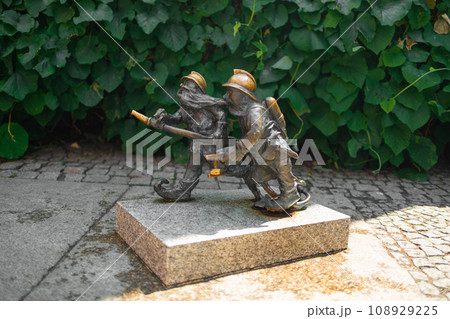 Wroclaw Dwarf. The small figurines in the streets of Wroclaw old town. Hunting for dwarfs, tourist attraction 108929225