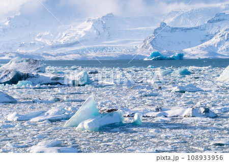 Iceland. Ice as a background. Vatnajokull National Park. Panoramic view of the ice lagoon. Iceland. Ice as a background. Vatnajokull National Park. Panoramic view of the ice lagoon. 108933956