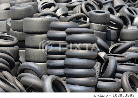 A Tower of Abandoned Rubber: A Pile of Forgotten Tires Waiting to be Recycled A Tower of Abandoned Rubber: A Pile of Forgotten Tires Waiting to be Recycled 108933995