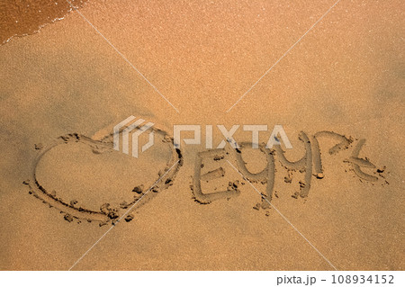 Beach. Shore of the Red Sea. Inscription on yellow sand. Egypt. Beach. Shore of the Red Sea. Inscription on yellow sand. Egypt. 108934152