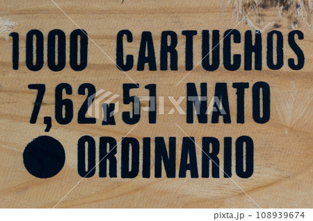 Wood texture background from army ammunition wooden crate with Spanish text - 1000 cartridges 7.62x51 Wood texture background from army ammunition wooden crate with Spanish text - 1000 cartridges 7.62x51 108939674
