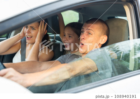 Shocked family frightened of accident during driving 108940191