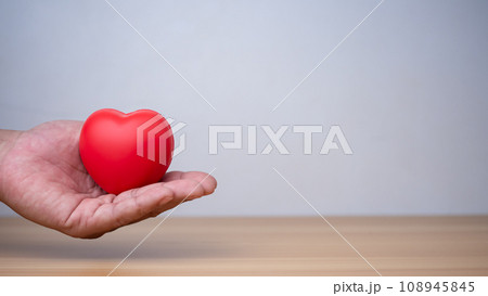 Good health and insurance concept, health insurance concept. Human hand holding red heart. 108945845