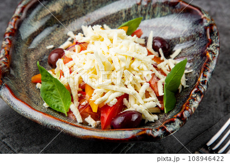 cherry tomatoes, spinach, eel, lime, cheese, side view cherry tomatoes, spinach, eel, lime, cheese, side view 108946422