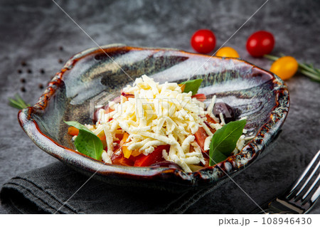 cherry tomatoes, spinach, eel, lime, cheese, side view cherry tomatoes, spinach, eel, lime, cheese, side view 108946430