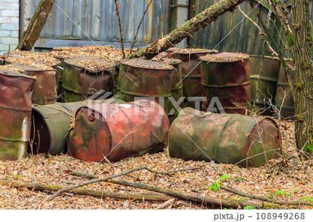 Old rusty barrels in the ghost town Pripyat in Chernobyl Exclusion Zone, Ukraine Old rusty barrels in the ghost town Pripyat in Chernobyl Exclusion Zone, Ukraine 108949268