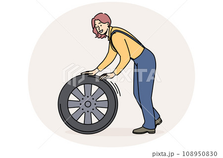 Smiling female mechanic with tire Smiling female mechanic with tire 108950830