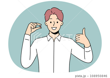Smiling man hold pill show thumb up 108950846