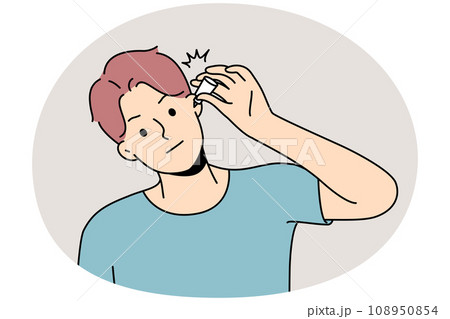 Unhealthy man using eardrops Unhealthy man using eardrops 108950854