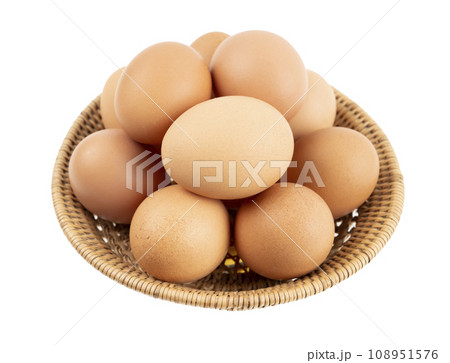 Eggs in basket isolated on white background 108951576